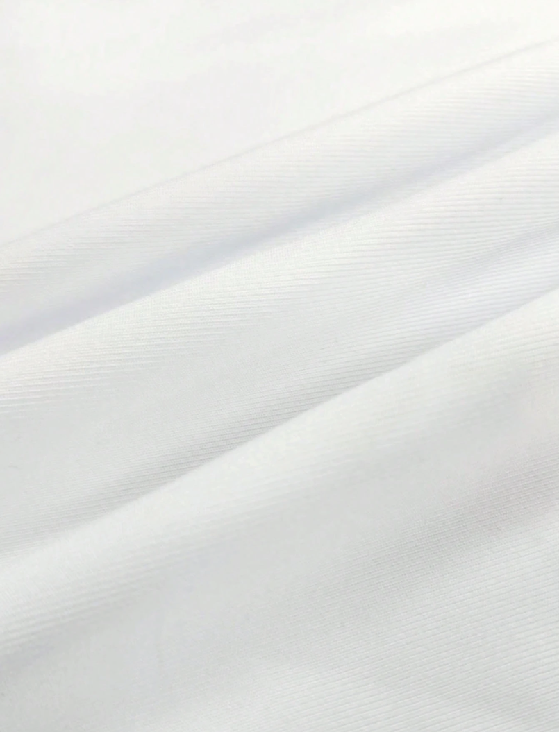 Close-up of white fabric with subtle texture